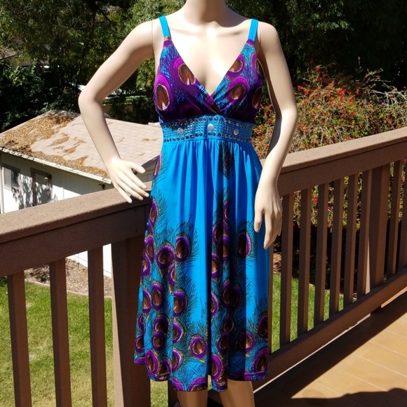 Magic Dresses & Skirts - Peacock Mini Dress